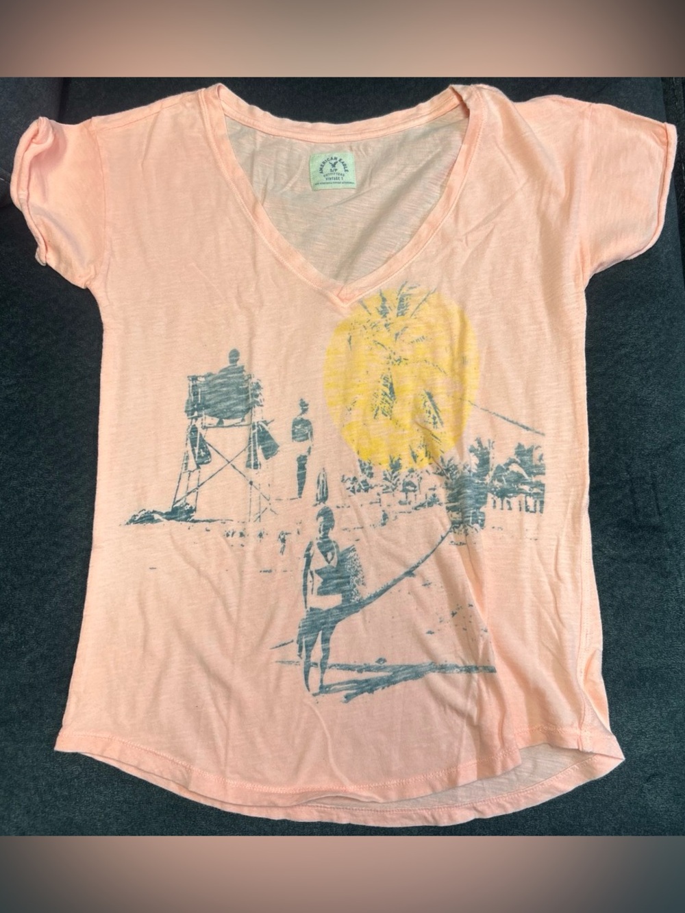 American Eagle Outfitters Peach V-Neck Graphic Tee with Yellow Sun